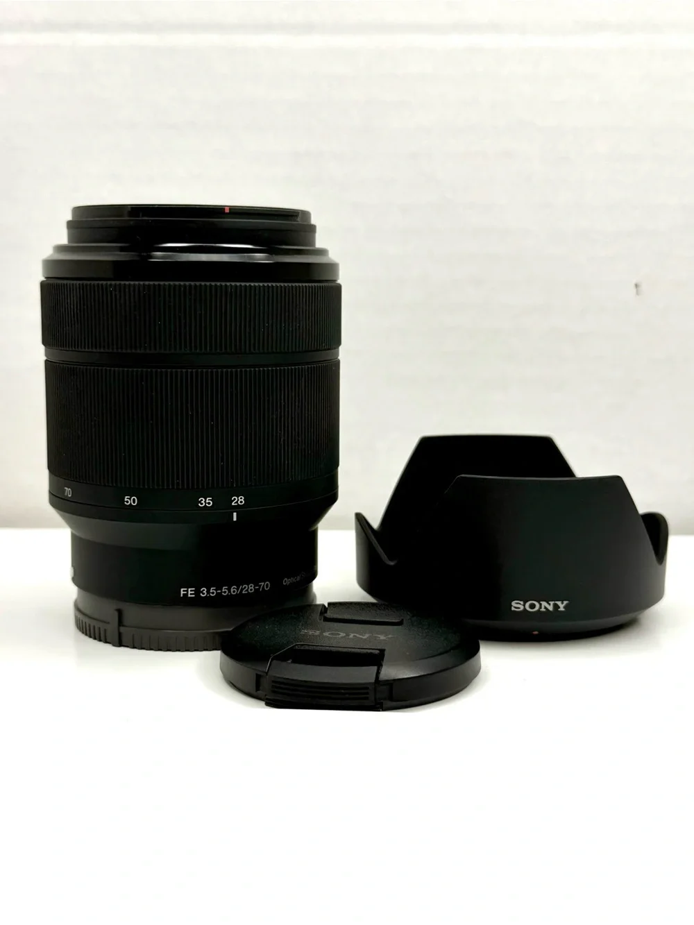 Sony Black FE 28-70mm f/3.5-5.6 Standard Zoom Lens with Hood and Cap